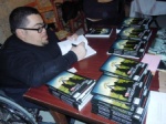 Orkun Boskurt signs his book